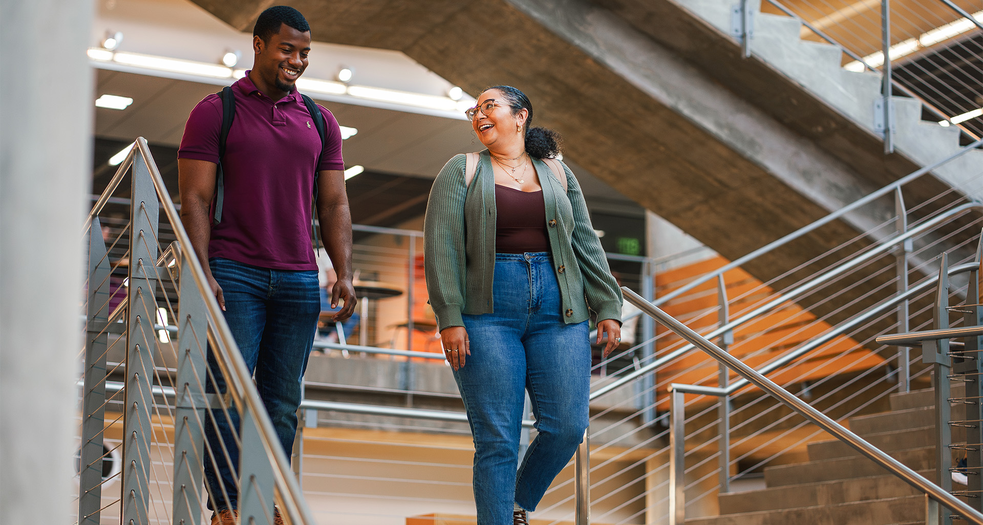 Scheller Full-time MBA students walk down stairs