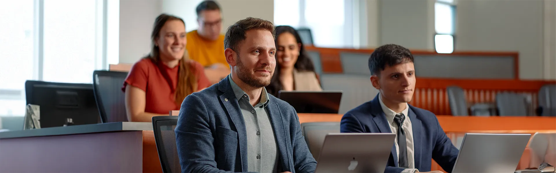 Potential PhD student sitting in classroom