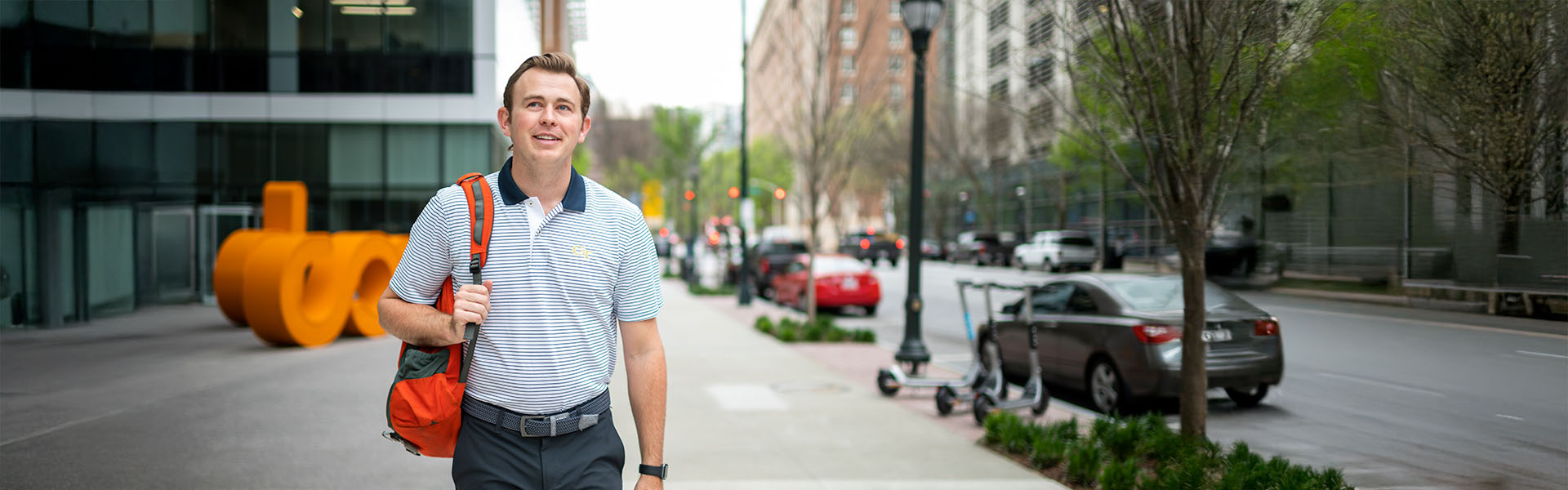 Entrepreneur student walks the street in Midtown Atlanta