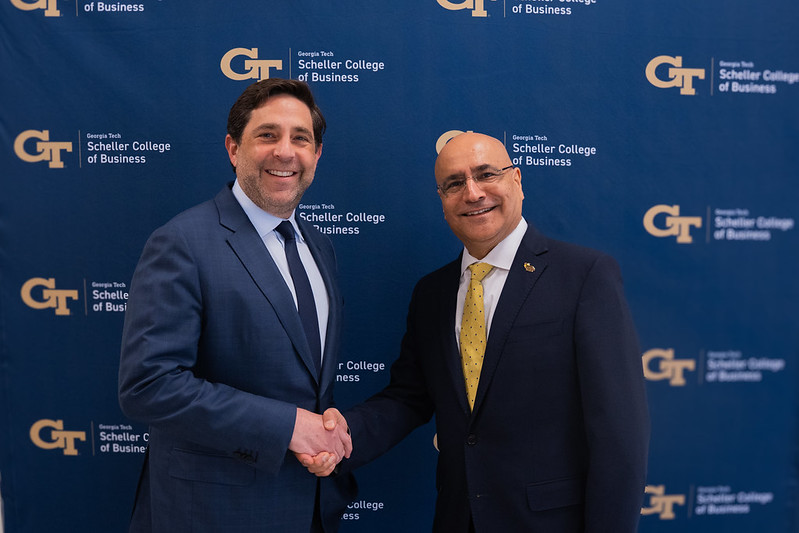 Andrew Schlossberg, President and CEO at Invesco and Dean Anuj Mehrotra