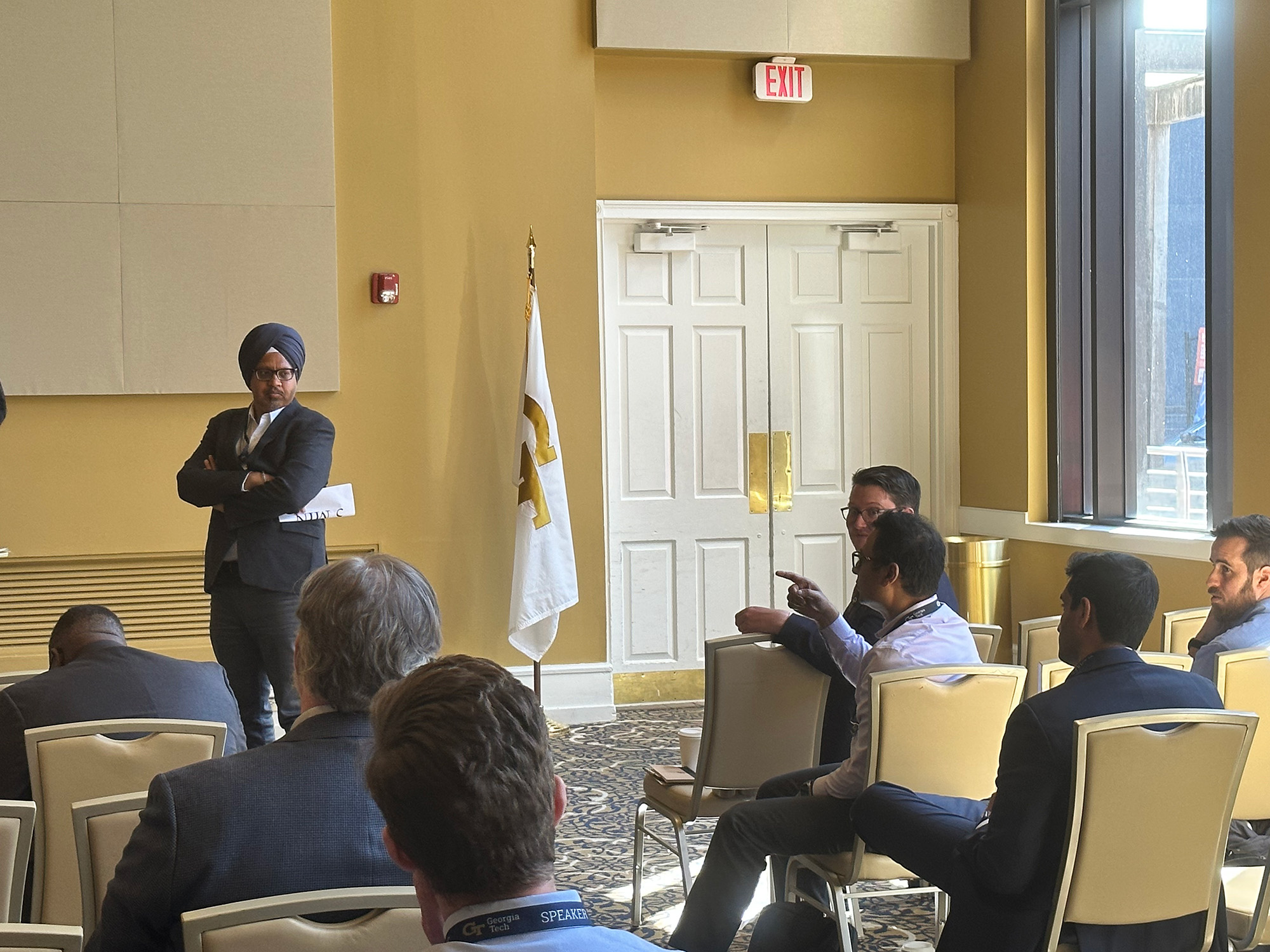 Household Finance Conference attendees are lead in conversation by Manpreet Singh, assistant professor of Finance at the Scheller College of Business.