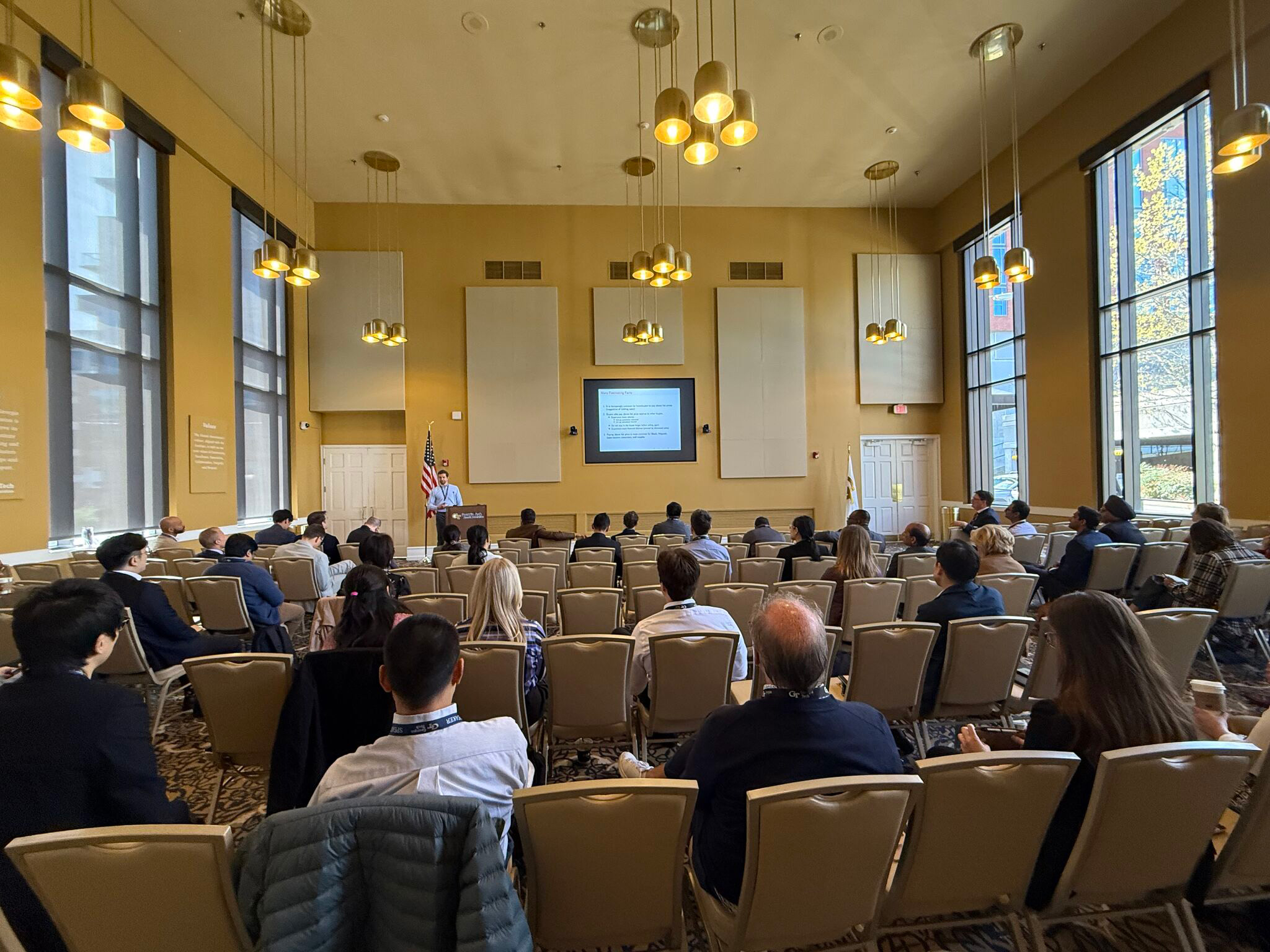 Household Finance Conference attendees gather in the Georgia Tech Alumni House.