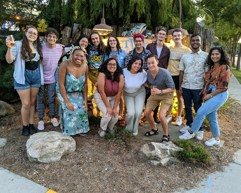 Members of Georgia Tech Lavender Alumni gather at a local brewery