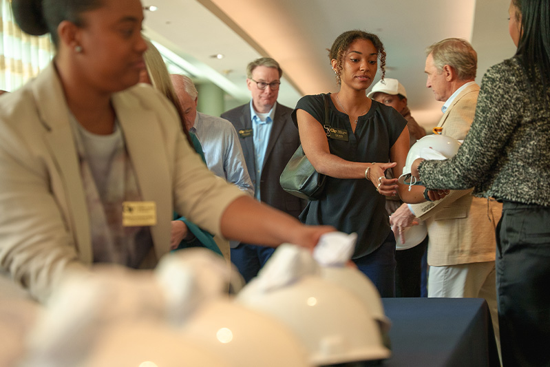People collect hard hats