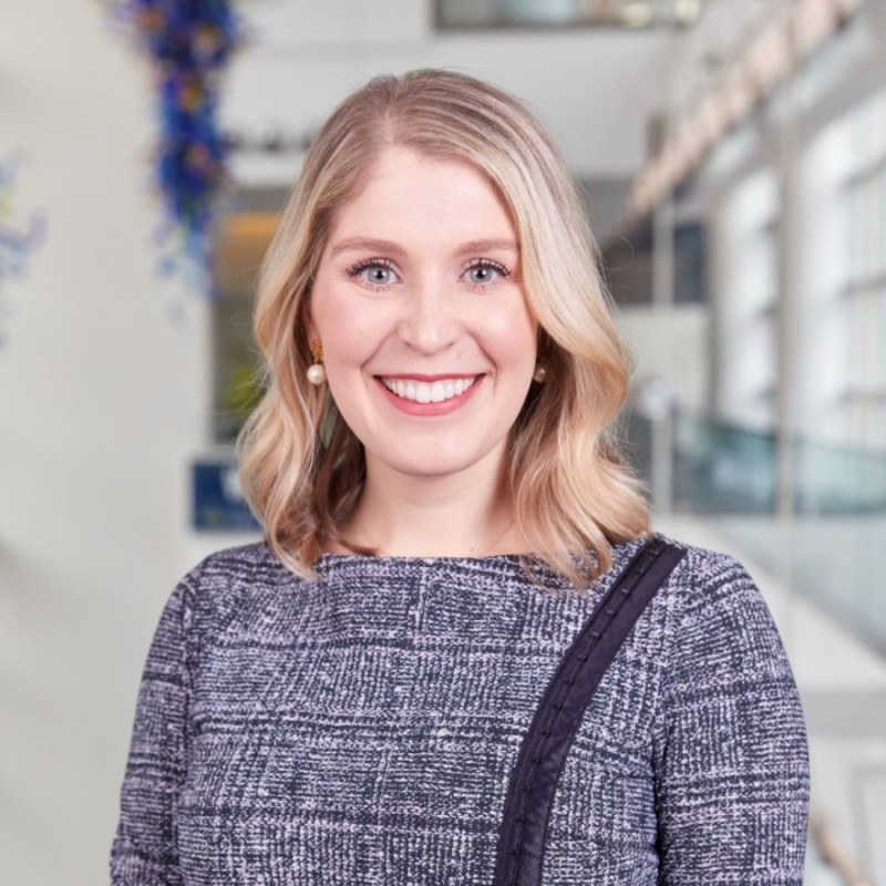 Kate Allan, Executive MBA, '21, dressed in a blue sweater