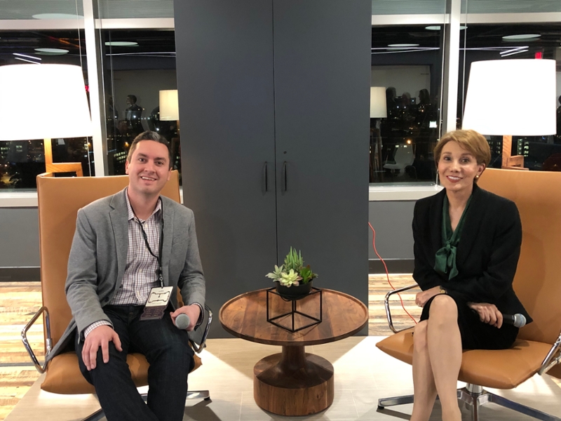 Joe Depa, Accenture’s Managing Director of Applied Intelligence, and Scheller College of Business Dean Maryam Alavi prepare for a discussion on artificial intelligence and the workforce at Accenture Atlanta's Innovation Hub opening.