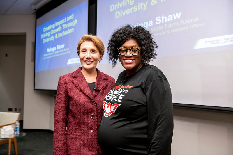 Nzinga Shaw (r) poses with Scheller College of Business Dean Maryam Alavi (l).
