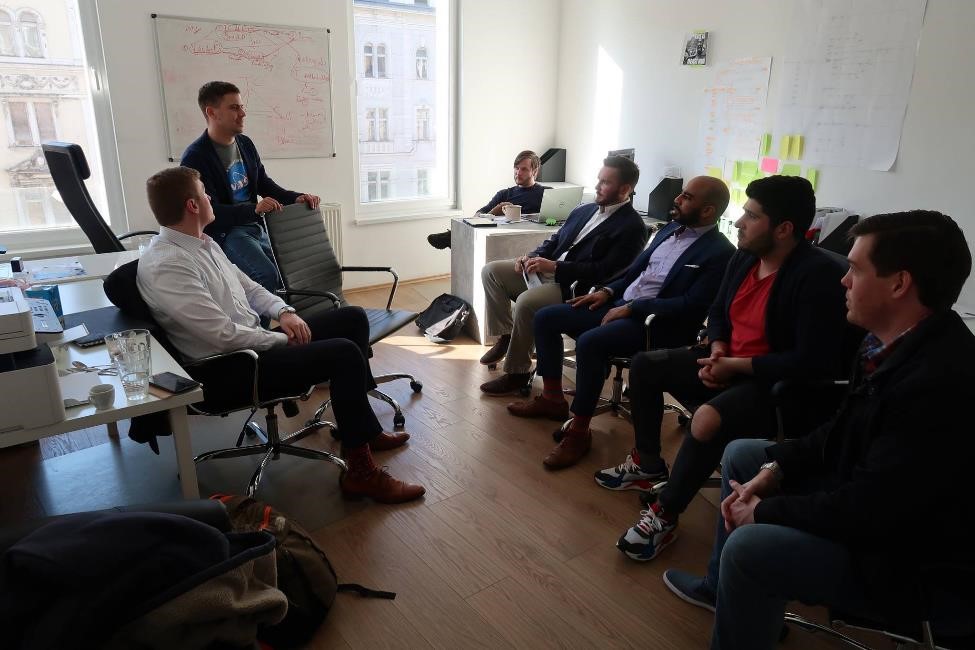 MBA team members meet their Hungarian client Trustchain for a mid-point presentation.