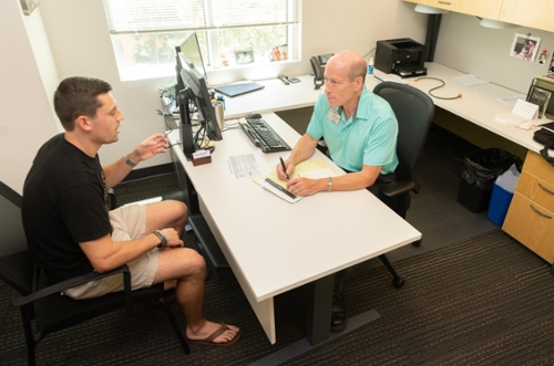 stan broome offers career advise to student Max Rehberger.