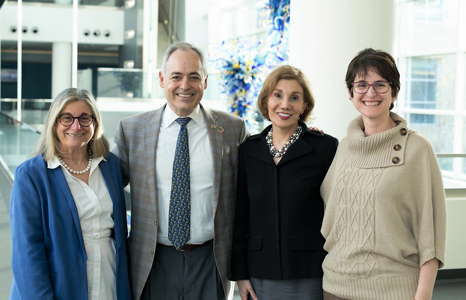 Terry Blum (from left), President Cabrera, Dean Alavi, Beril Toktay