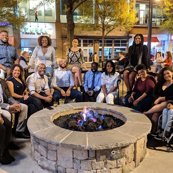 Board members from the first three years of Blacks in Business pictured during the annual leadership transition gathering, handing over the reins to the fourth year’s board (Spring 2019).
