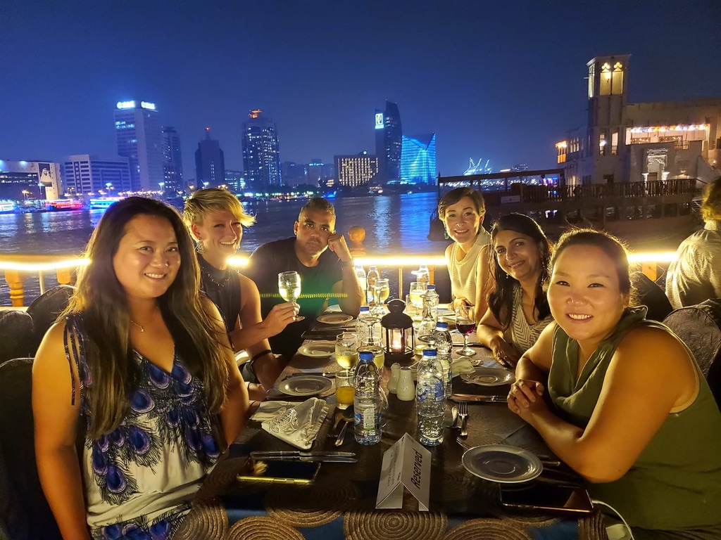 A group of students at dinner in Dubai