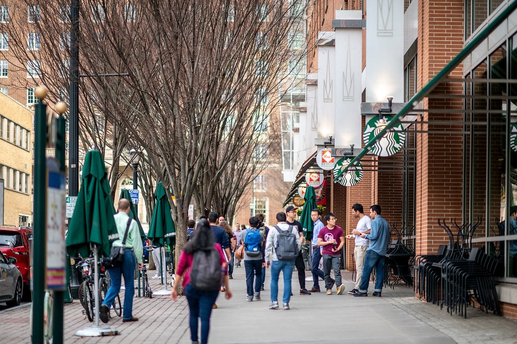 Professionals, Georgia Tech students, and residents mix on 5th Street.