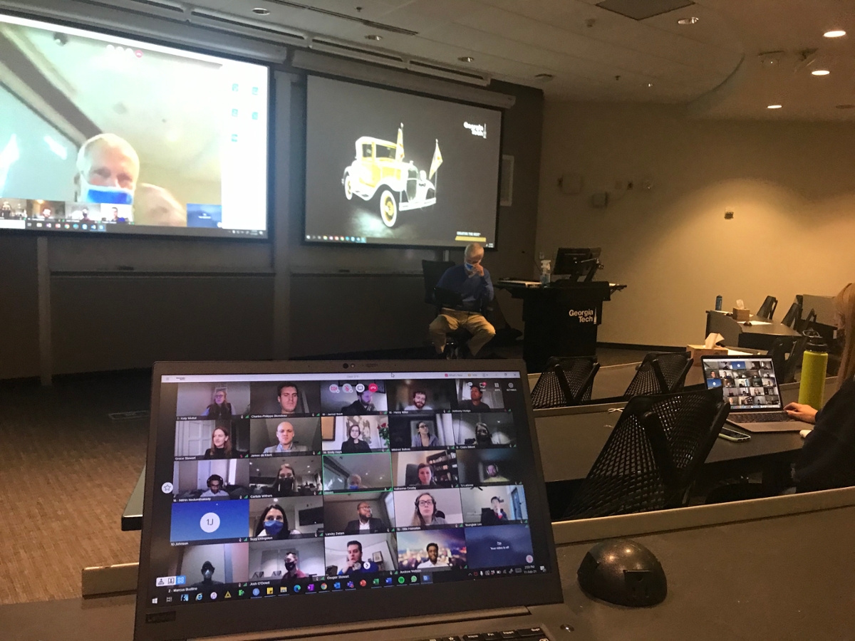 Full-time MBA students join class in person and through web conference.