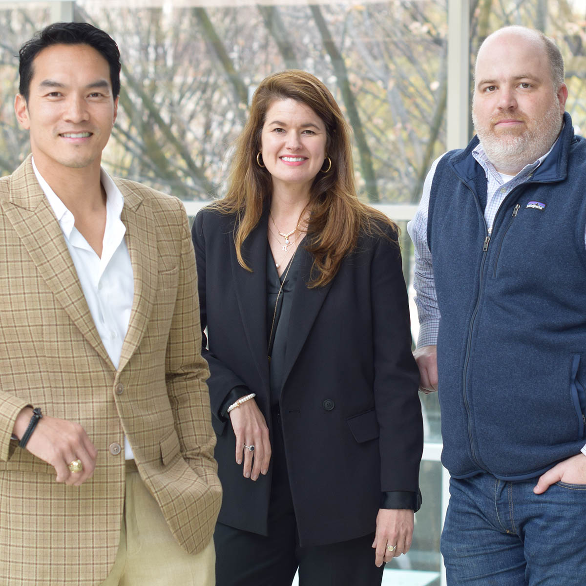 Group photo of three former MBA's