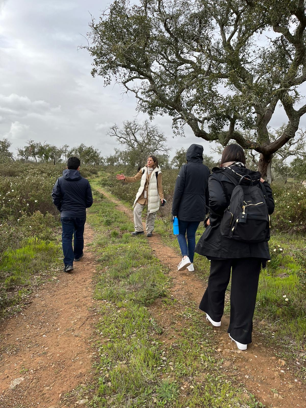 A group of people on a dirt path