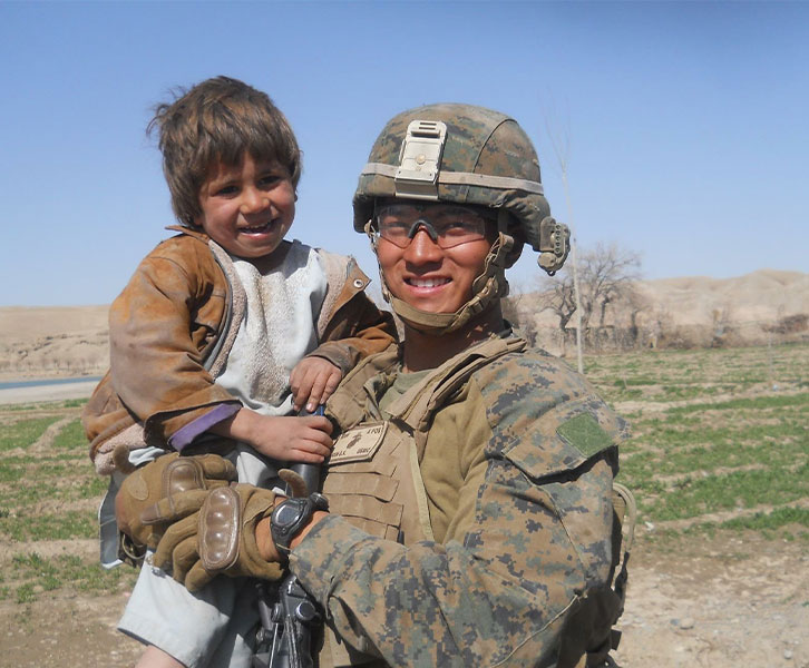 David Pham and Afghan child