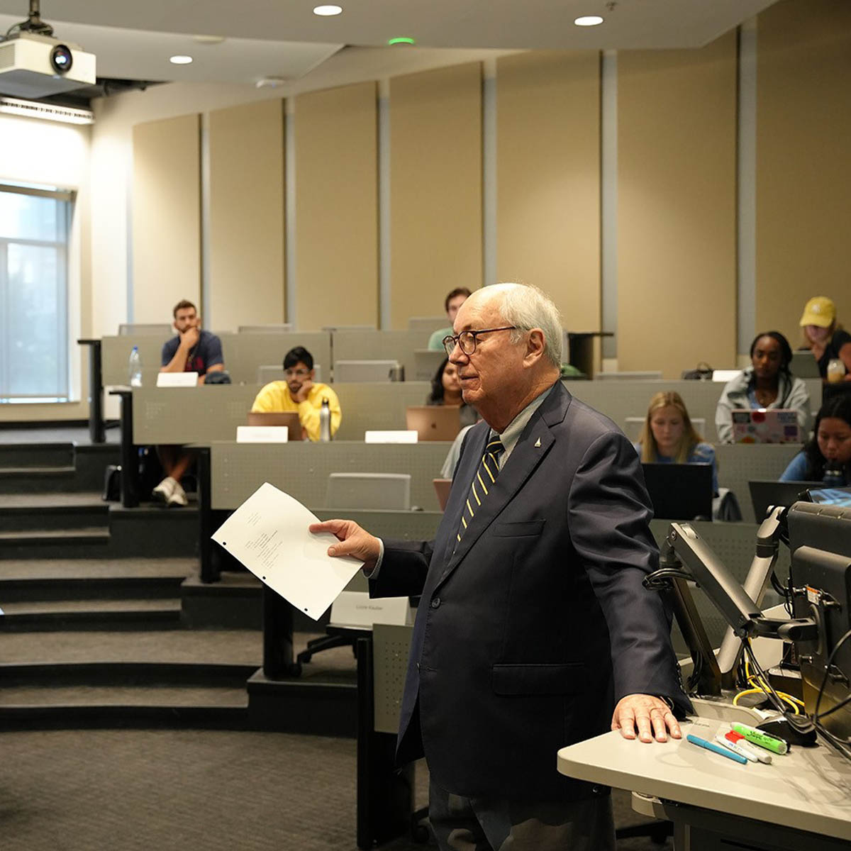 Bill Todd is shown in a classroom teaching Management in the Healthcare Sector, a course he’s teaching for the 35th time since joining Scheller in 2011. 