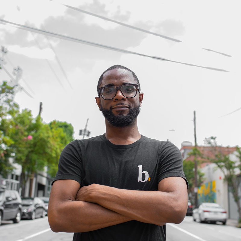 Brandon Butler, CEO of Butter.ATL, standing in the middle of the street.