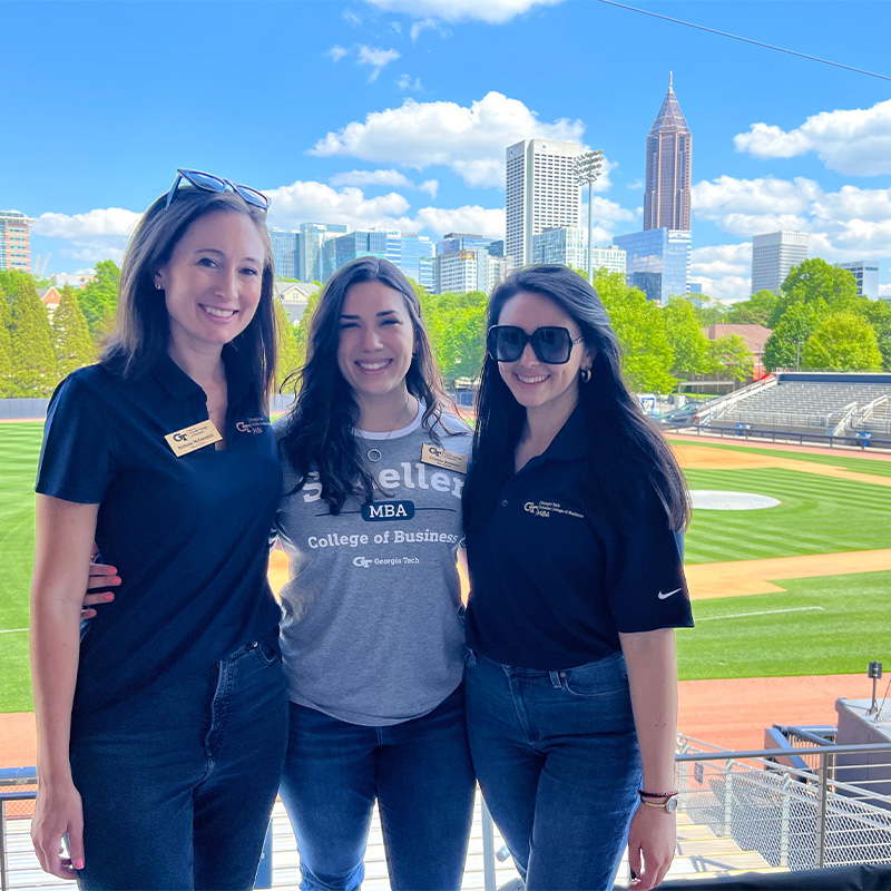Cristina Dow at the Georgia Tech baseball field with her MBA friends