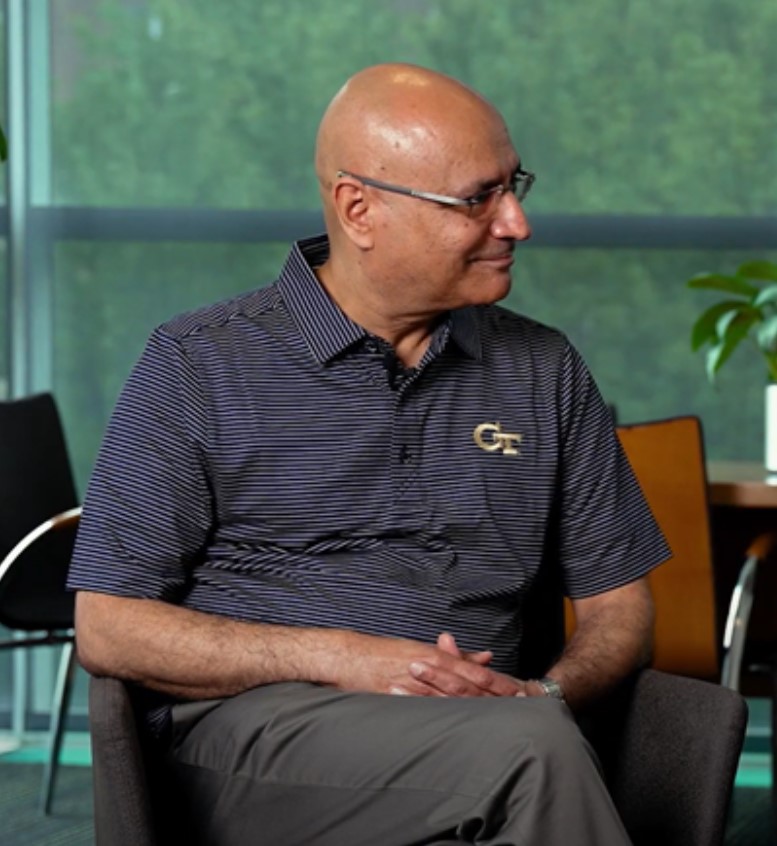 Dean-Elect Anuj Mehrotra sitting in a chair 