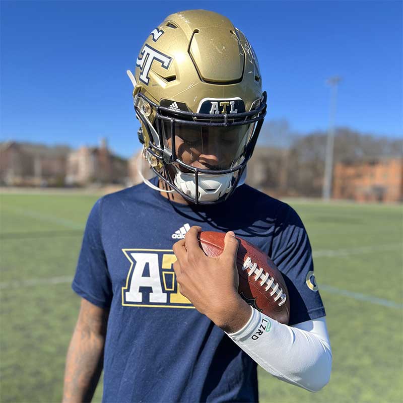 Georgia Tech football players use the LZRD Tech arm sleeve.