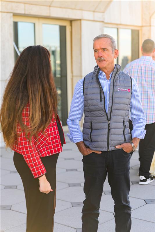  Chris Hadfield talking with colleague outside