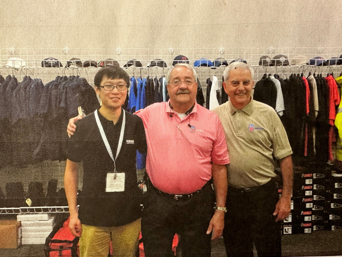 Allan (far right), with Jerrell Oaks, president and founder of NAFECO, and Chinese colleague, 2008