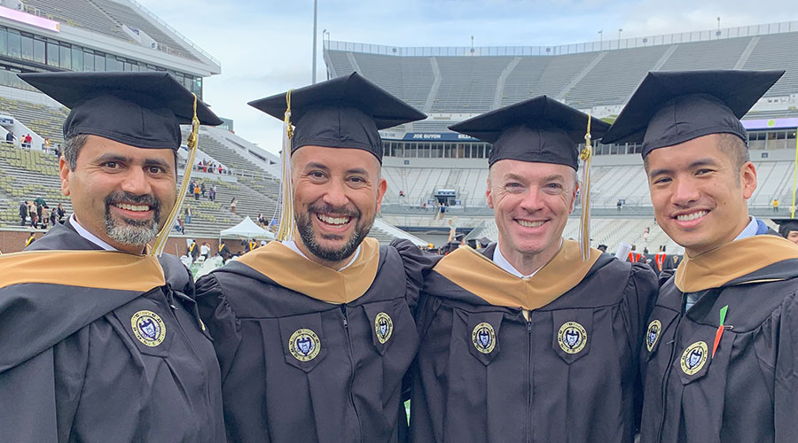 Phong Truong with some of his Executive MBA classmates at graduation.