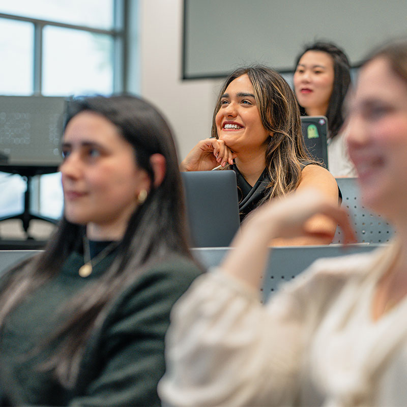 A group of women in a lecture hall