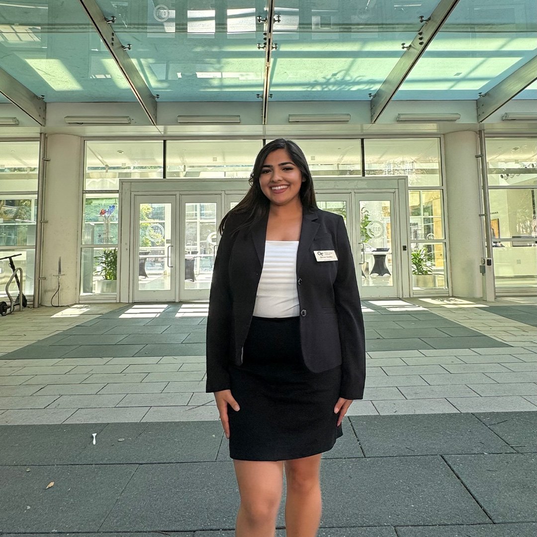Savreet Sandhu, Full-time MBA ’26 and TI:GER program student stands in front of the Scheller College of Business