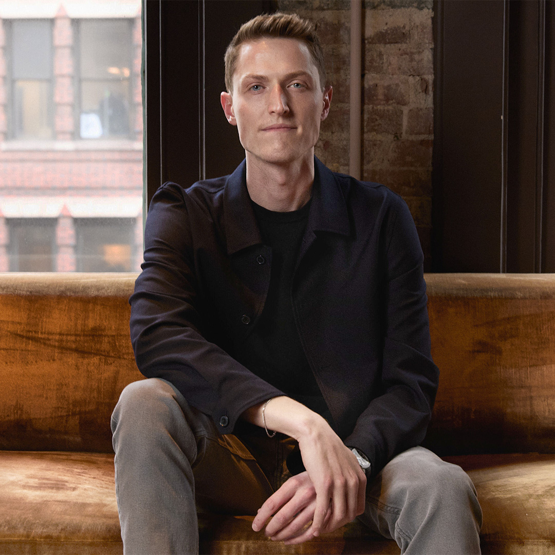 Sean Henry, CEO of Stord and former Scheller College of Business student, sits on a coach