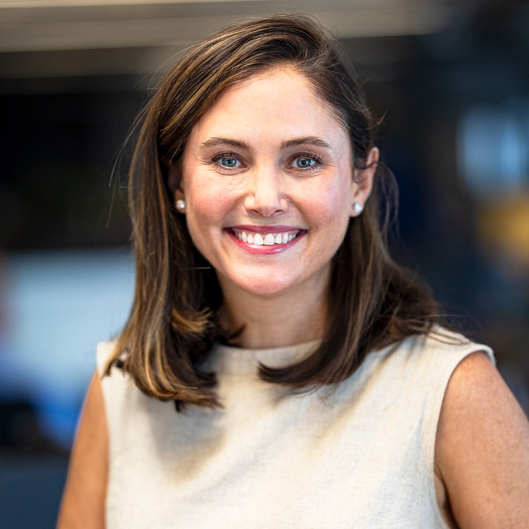 Paige Todd, co-founder and chief people officer, Flock Safety smiles for a headshot photo