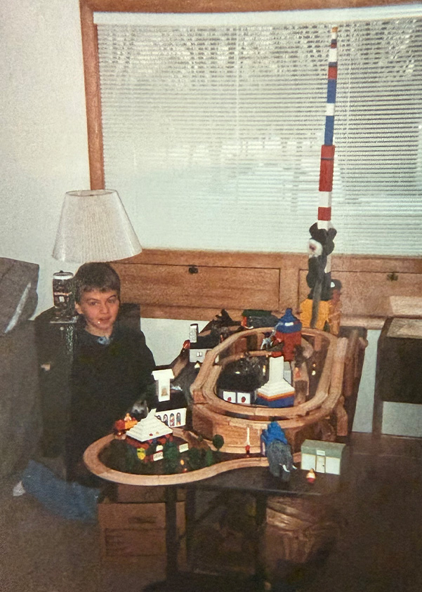 Corey Conklin as a child building with blocks