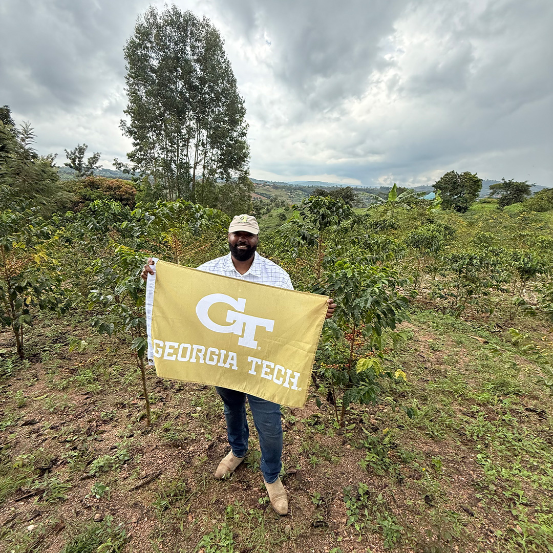 Elonte’ Porter, Evening MBA ‘26, stands in a field in Rwanda during the 2026 MBA International Practicum