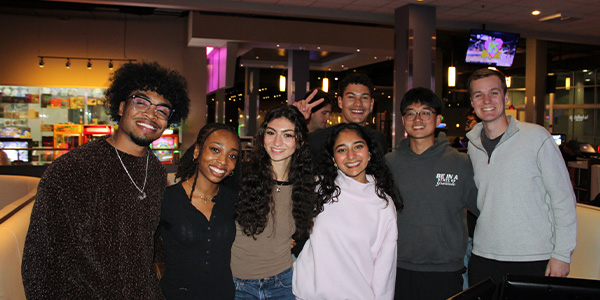 Vedika Singh, third from right, poses with other Scheller Business Ambassadors.