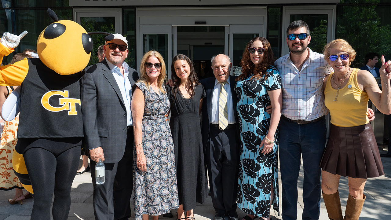 The Ernie Scheller family celebrates the ribbon-cutting of the new George Tower | Scheller Tower.