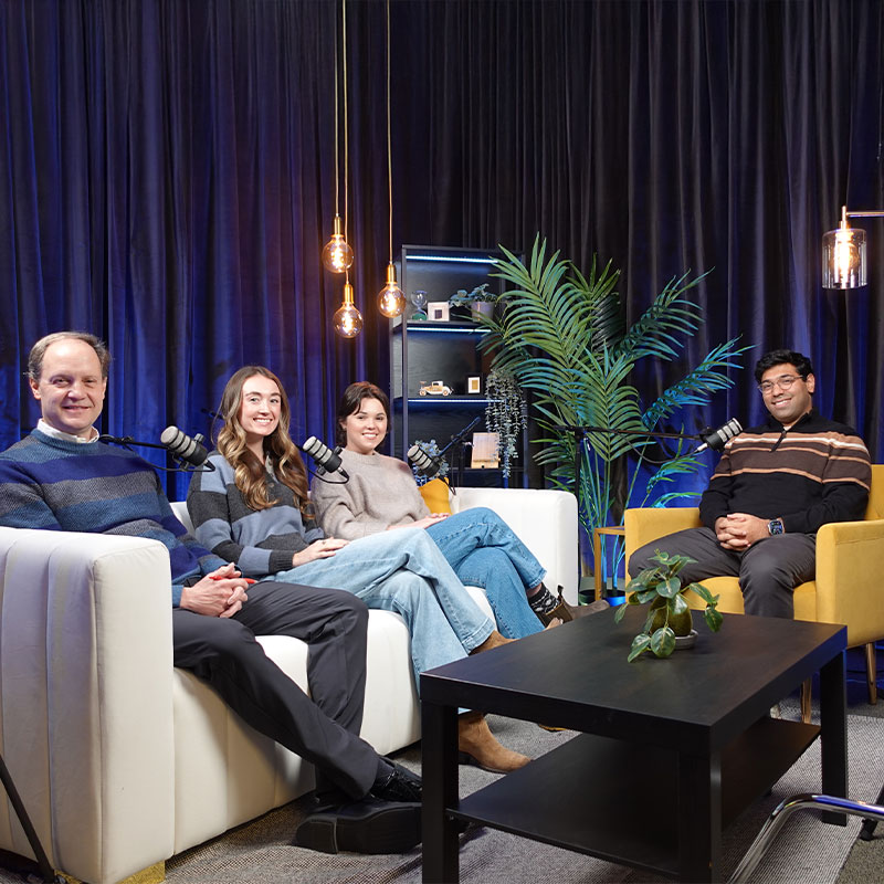 Two Full-time MBA students, a professor, and a podcast host discussing the Marketing Innovation Conference @ Scheller 2026. 