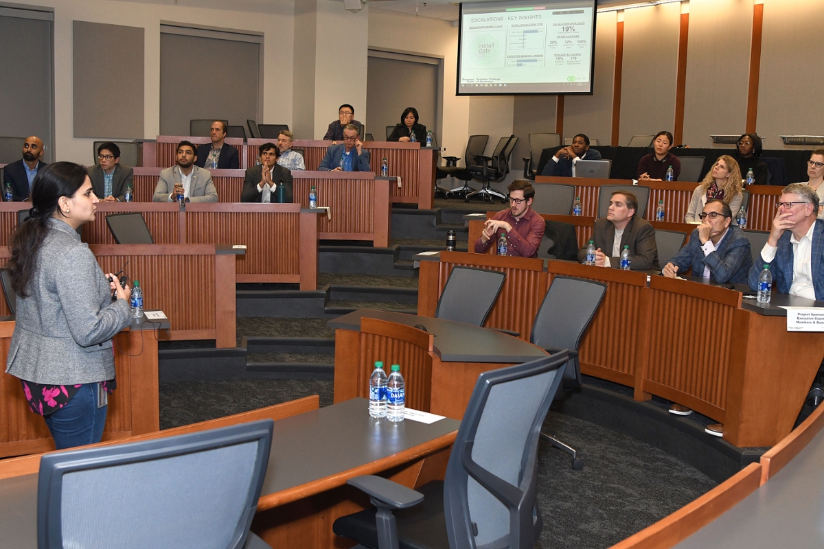 Mridula Bhasin presents her team's recommendations to the audience.
