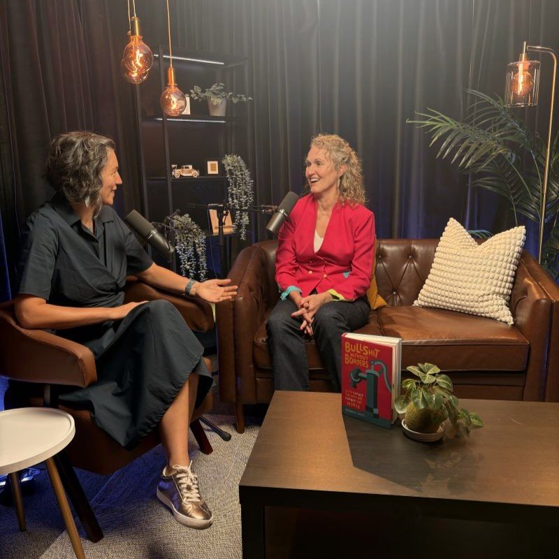Dori Pap and Susan Davis sitting down to record a podcast episode.