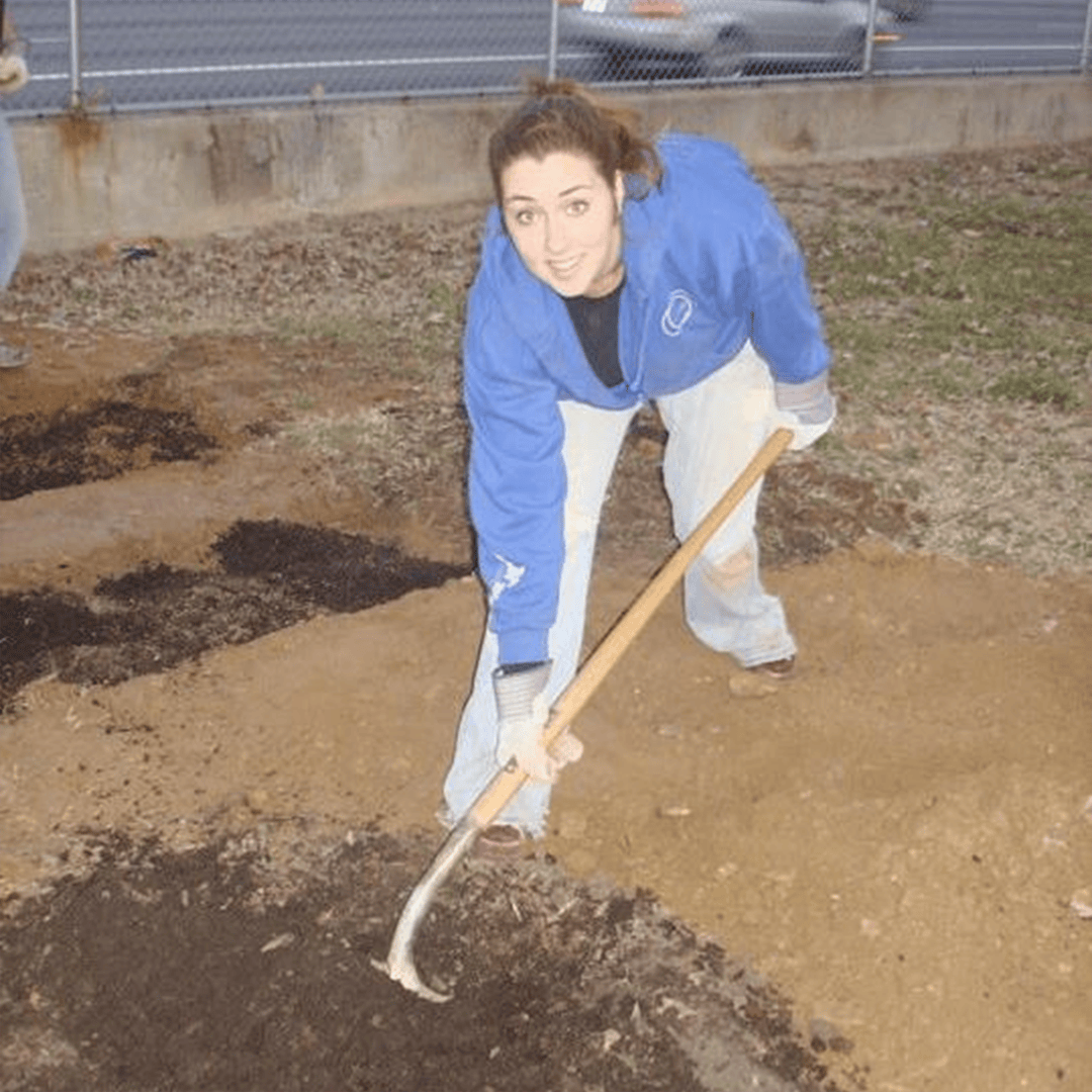 As an undergraduate, Nell Fry works in the Georgia Tech community garden (at its second location next to the highway).