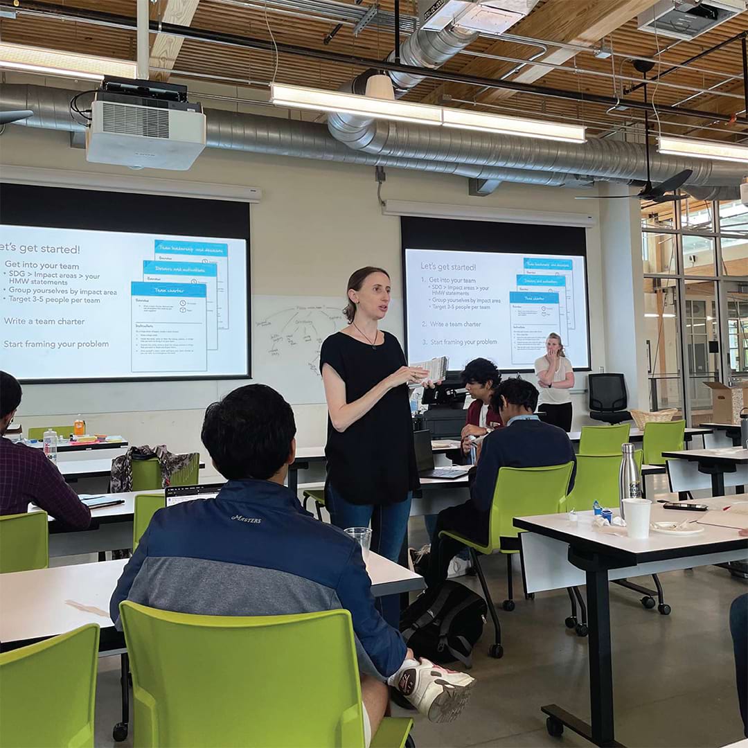 Jackie Stenson prepares Sustainable-X bootcamp participants to get started on their team projects.