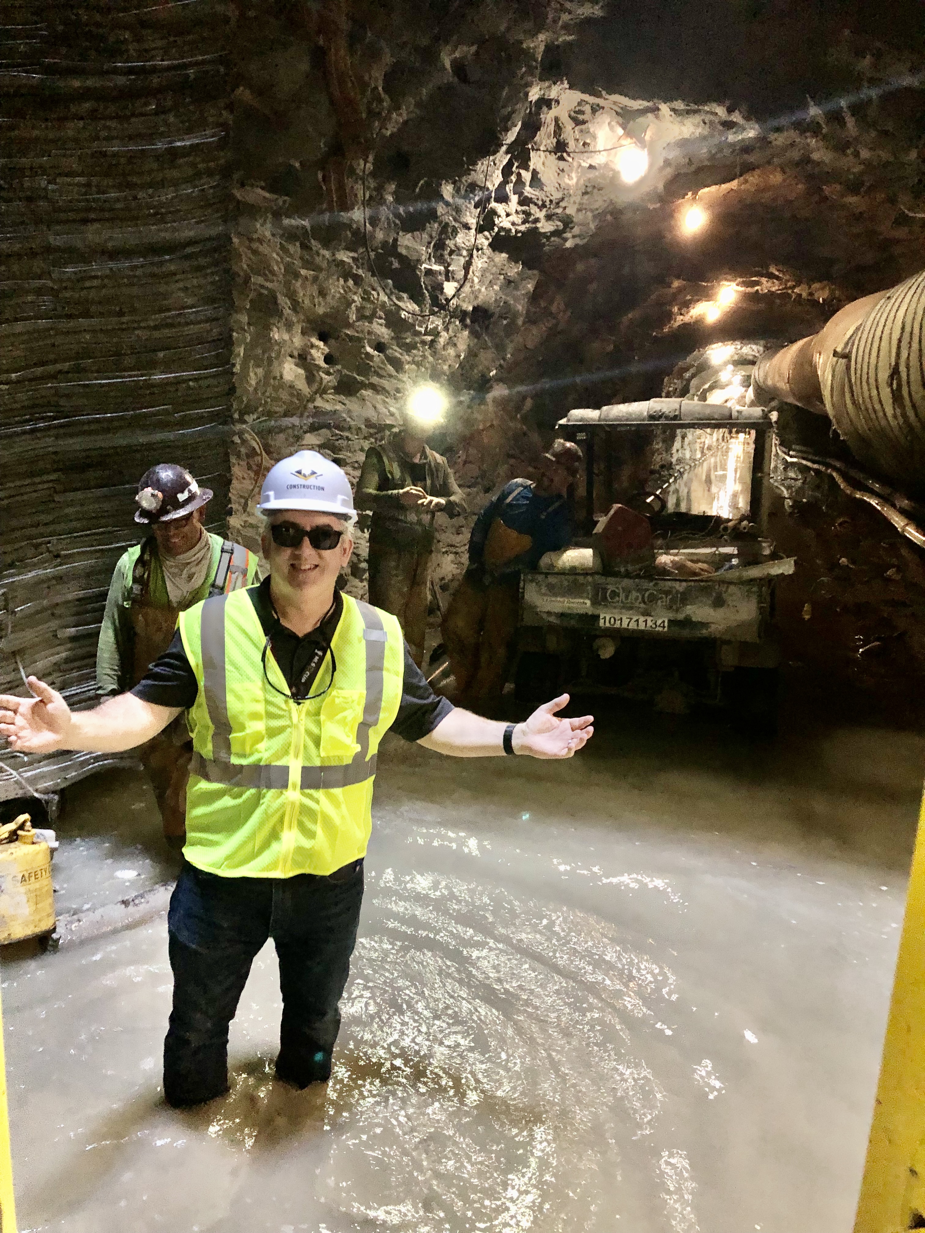 Dave Williams stands at the bottom of a 350-feet deep, 30-foot diameter shaft at Atlanta’s Clayton Water Reclamation Center.
