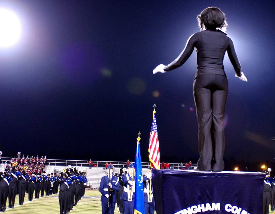 Learning to lead: In 2013, Unwanna conducted the Effingham County High School marching band from atop the drum major’s podium.