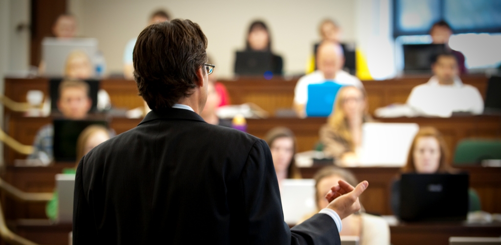 Students listen to professor.