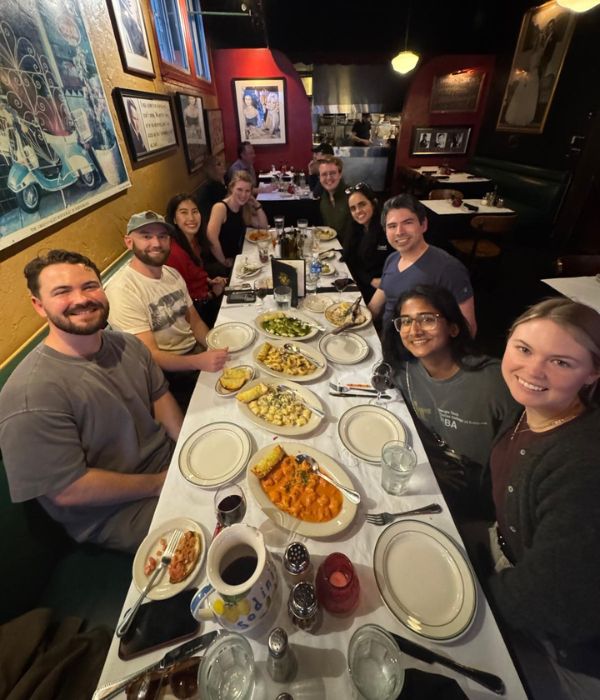 Lauren Dasher sitting at a group dinner